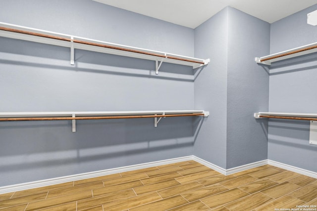 5882 Castle Run, San Antonio, TX 78218 - spacious closet featuring wood finish floors