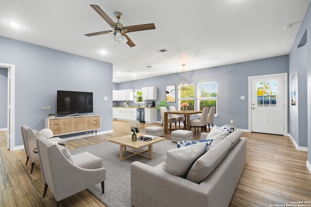 5882 Castle Run, San Antonio, TX 78218 - living room featuring baseboards, light wood-type flooring, ceiling fan, and recessed lighting