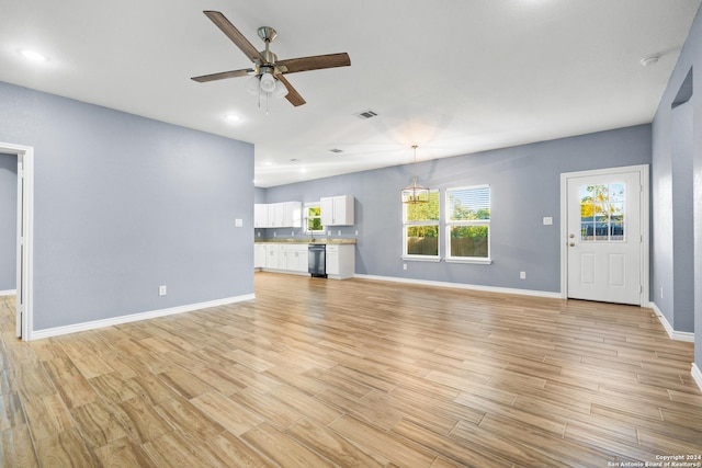 5882 Castle Run, San Antonio, TX 78218 - unfurnished living room featuring ceiling fan, light wood-type flooring, baseboards, and recessed lighting
