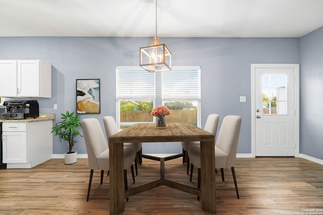 5882 Castle Run, San Antonio, TX 78218 - dining area with plenty of natural light, light wood finished floors, and baseboards