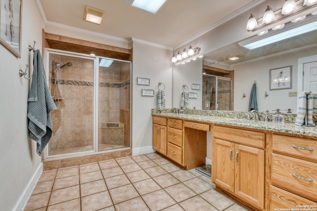 bathroom featuring vanity, tile patterned floors, and ornamental molding