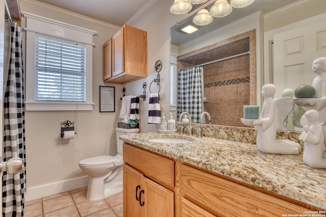 bathroom featuring toilet, ornamental molding, vanity, tile patterned flooring, and baseboards