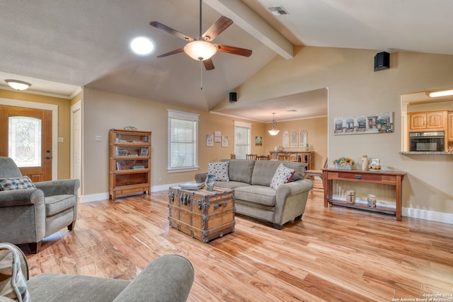 living room featuring light wood-type flooring, lofted ceiling with beams, and ceiling fan