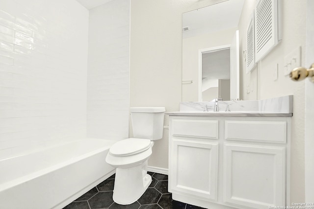 full bathroom featuring tile patterned floors, shower / washtub combination, vanity, and toilet