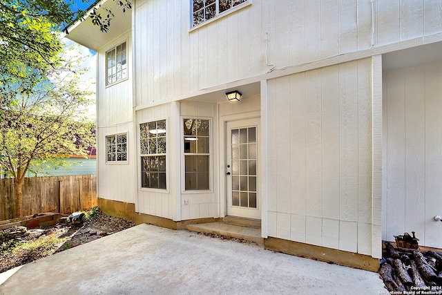 doorway to property with a patio area