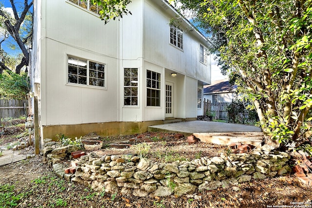 rear view of house with a patio