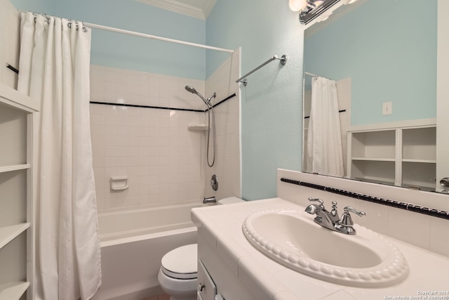 full bathroom featuring crown molding, vanity, shower / tub combo with curtain, and toilet