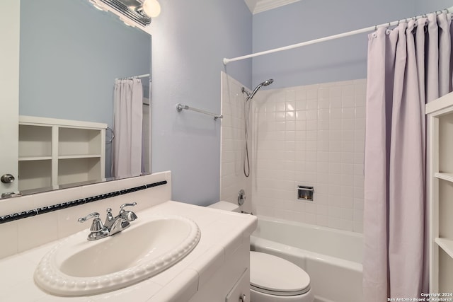 full bathroom featuring vanity, shower / bathtub combination with curtain, and toilet