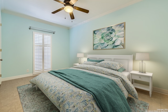 tiled bedroom with crown molding and ceiling fan