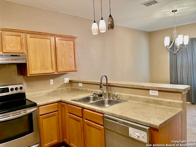 kitchen with exhaust hood, sink, decorative light fixtures, appliances with stainless steel finishes, and a notable chandelier