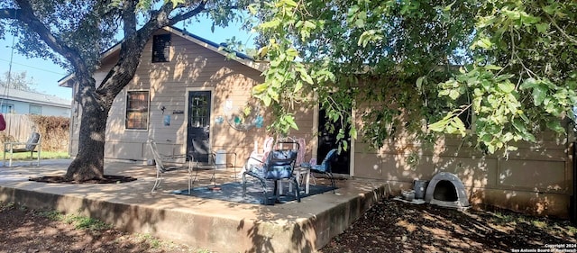 back of house featuring a patio area