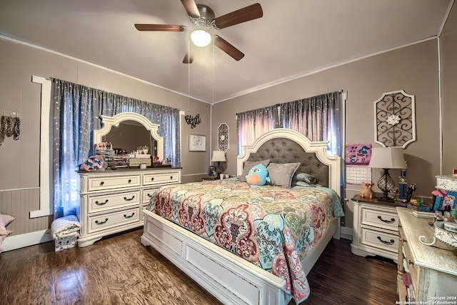 bedroom featuring dark hardwood / wood-style floors and ceiling fan