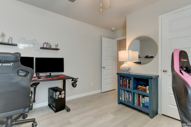 office area featuring light hardwood / wood-style flooring and ceiling fan