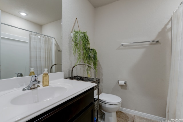 bathroom with tile patterned floors, vanity, toilet, and a shower with shower curtain