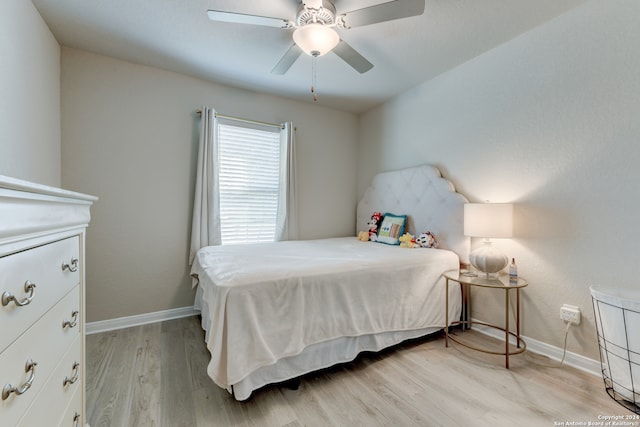 bedroom featuring ceiling fan and light hardwood / wood-style floors