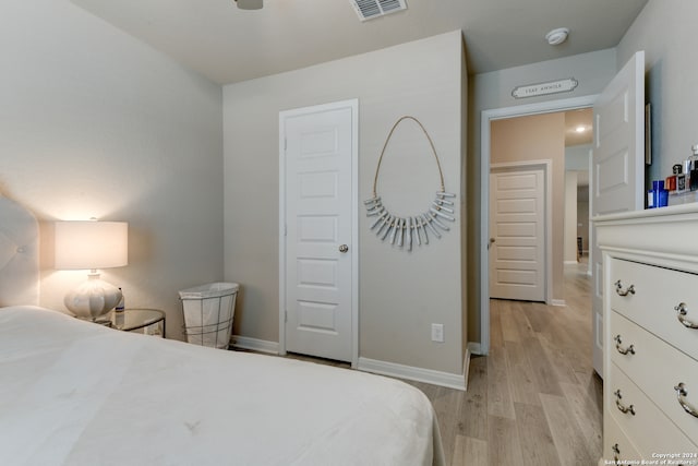 bedroom with light hardwood / wood-style floors