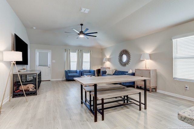 bedroom featuring light wood-type flooring, ceiling fan, and lofted ceiling