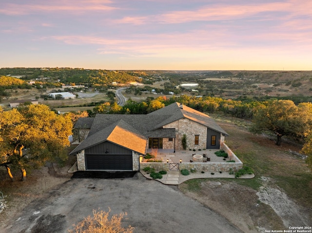 view of aerial view at dusk