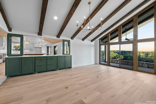 160 Mountain Way, Kerrville, TX 78028 - kitchen featuring green cabinets, a chandelier, beamed ceiling, open floor plan, and light wood-style flooring