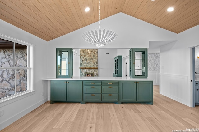 bar with light hardwood / wood-style floors, green cabinets, wood ceiling, and vaulted ceiling