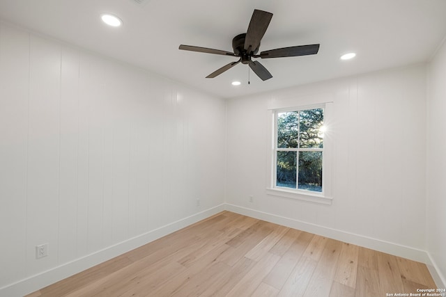 unfurnished room with light hardwood / wood-style floors and ceiling fan