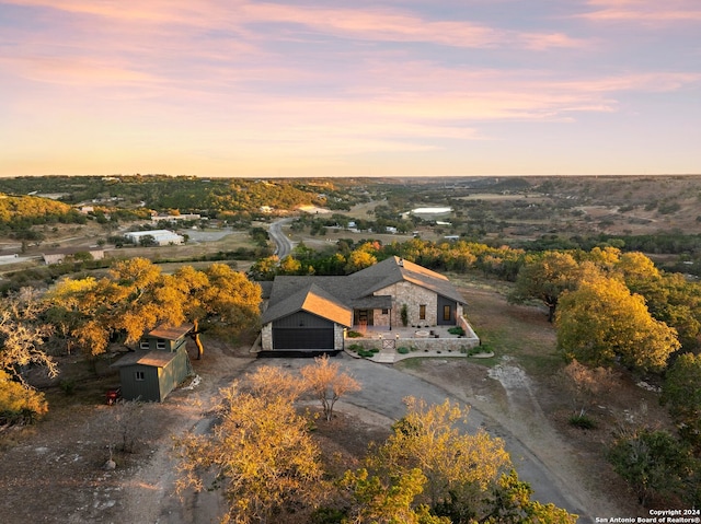 view of aerial view at dusk