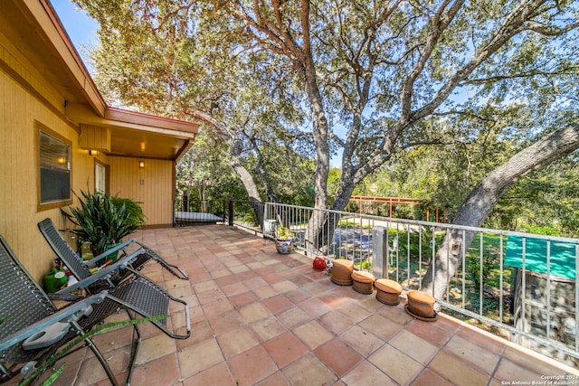 view of patio / terrace with a balcony