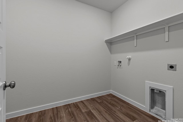 laundry area featuring hookup for an electric dryer, hookup for a gas dryer, dark hardwood / wood-style flooring, and hookup for a washing machine