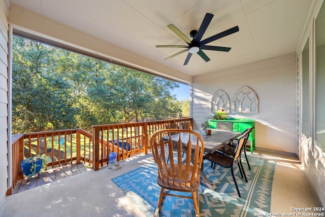 view of patio / terrace featuring a wooden deck and ceiling fan