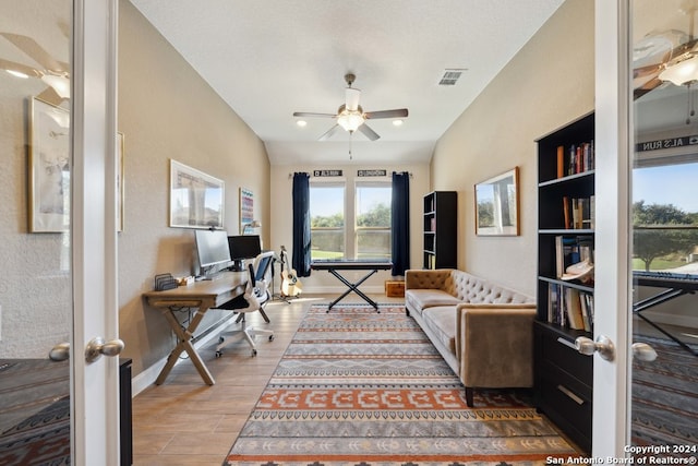 office area with ceiling fan, wood-type flooring, and french doors