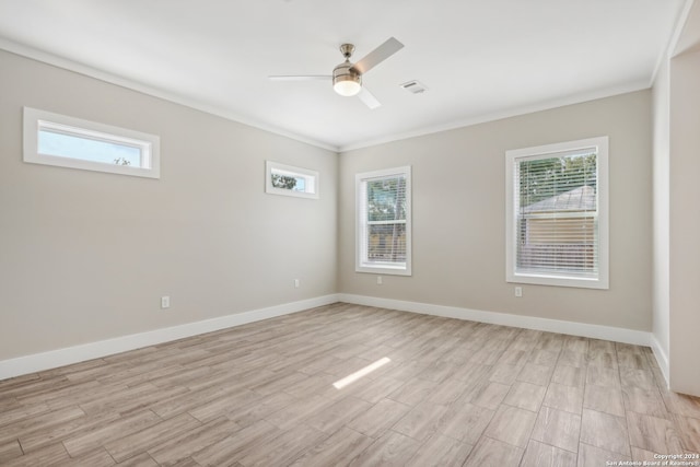 unfurnished room featuring light hardwood / wood-style floors, ceiling fan, and crown molding