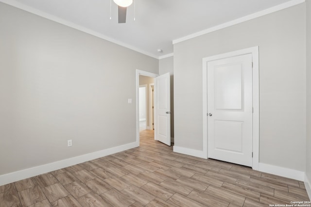 unfurnished bedroom with ceiling fan, light hardwood / wood-style floors, and ornamental molding