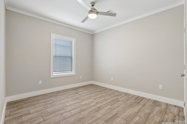 empty room featuring ceiling fan, light hardwood / wood-style floors, and ornamental molding