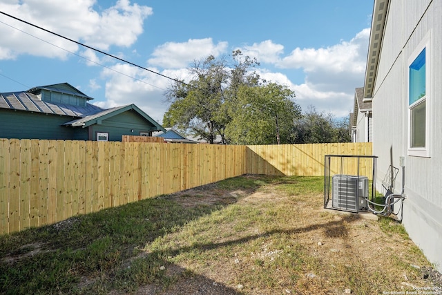 view of yard featuring central AC unit