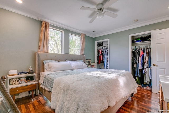 bedroom featuring ornamental molding, ceiling fan, and dark wood-type flooring