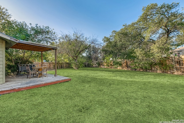 view of yard with a deck