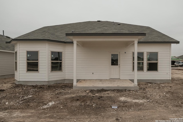 6727 Tasajillo Spg, San Antonio, TX 78253 - rear view of property with a shingled roof and a patio