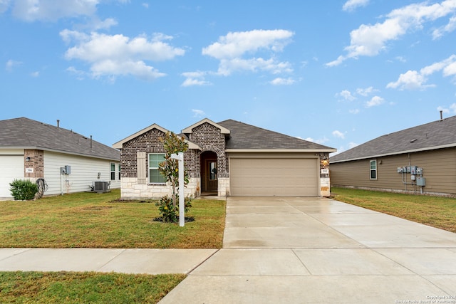 single story home featuring central AC, a front lawn, and a garage