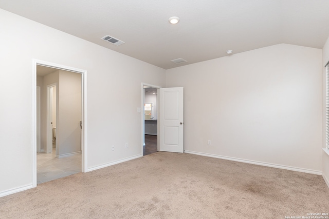 unfurnished bedroom with light carpet