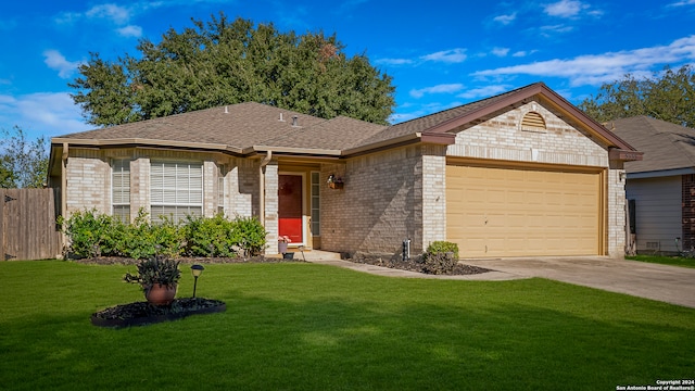 single story home with a front yard and a garage