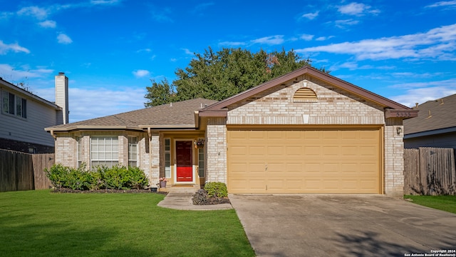 single story home with a garage and a front lawn