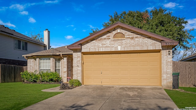 single story home with a front lawn and a garage