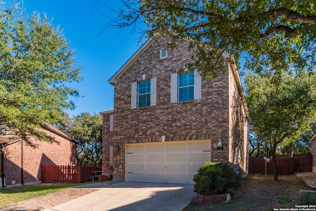 front of property with a garage