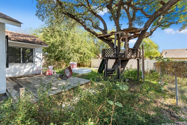 view of yard featuring a deck