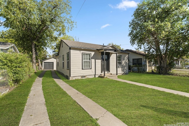 611 Kirk Pl, San Antonio, TX 78225 - bungalow-style house featuring driveway, a garage, and an outbuilding