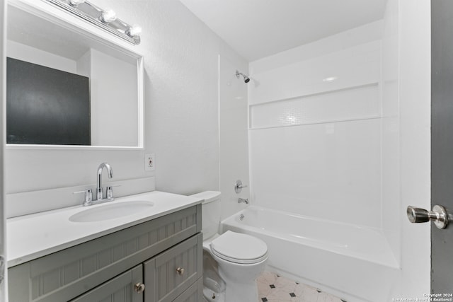 full bathroom featuring bathtub / shower combination, vanity, and toilet