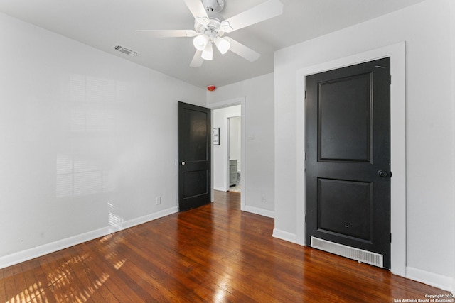 611 Kirk Pl, San Antonio, TX 78225 - unfurnished bedroom with wood finished floors, baseboards, and a ceiling fan