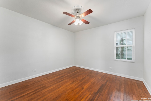 unfurnished room with ceiling fan and hardwood / wood-style flooring