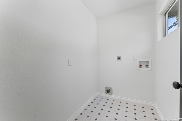 611 Kirk Pl, San Antonio, TX 78225 - laundry area featuring hookup for an electric dryer, baseboards, washer hookup, and light floors