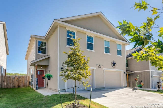 7544 Magnolia Vlg, San Antonio, TX 78252 - view of front of home featuring a garage, concrete driveway, and stucco siding